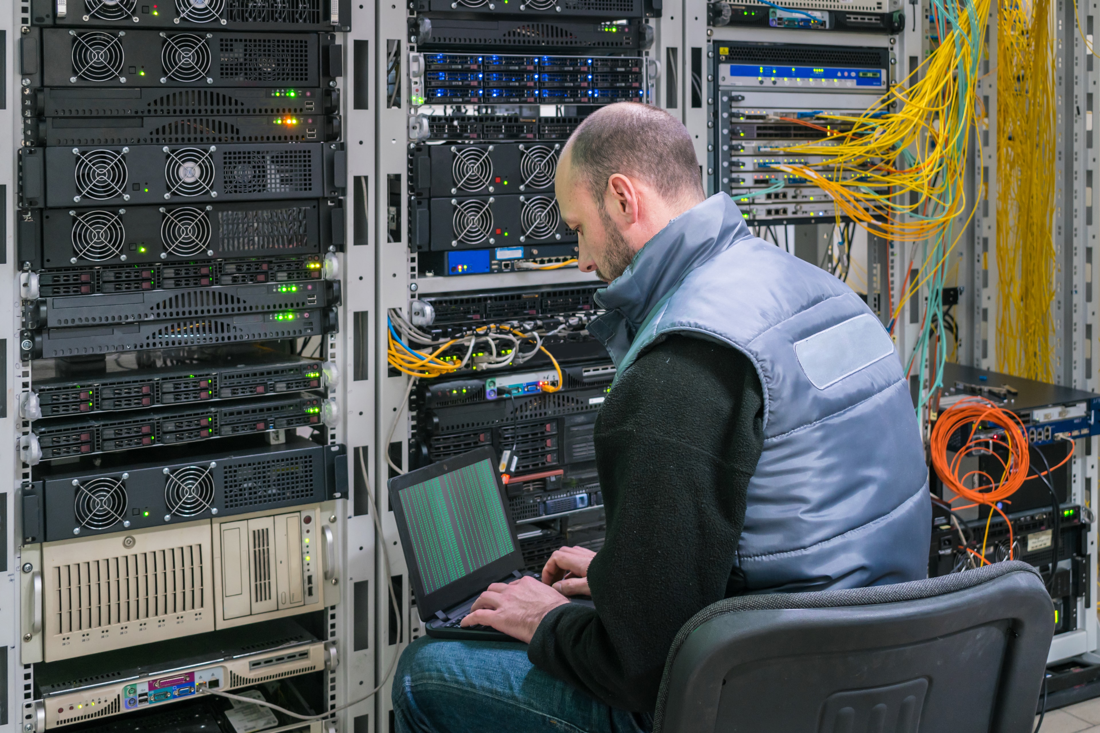 IT technician working on vessel systems